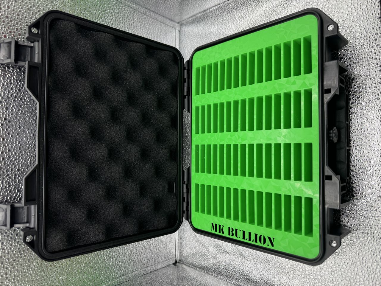 Signal green bar insert inside an open MK Bullion case