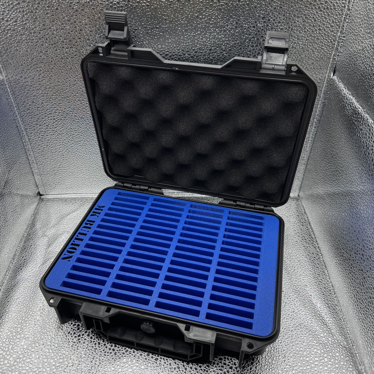 Deep blue coin insert inside an open MK Bullion case
